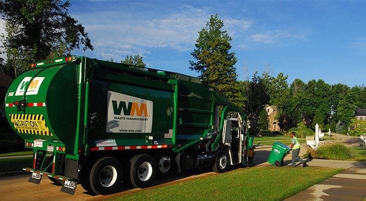 Waste Management truck outside home